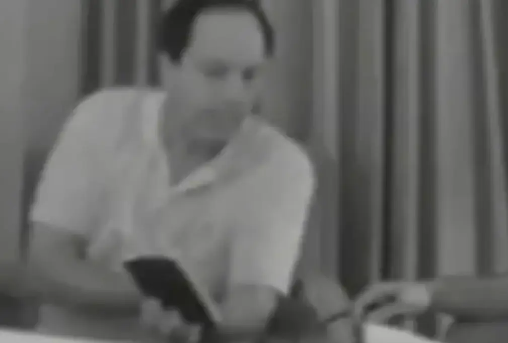 Footage shows Alfredo Rodriguez trying to sell the 'little black book' (US Department of Justice)