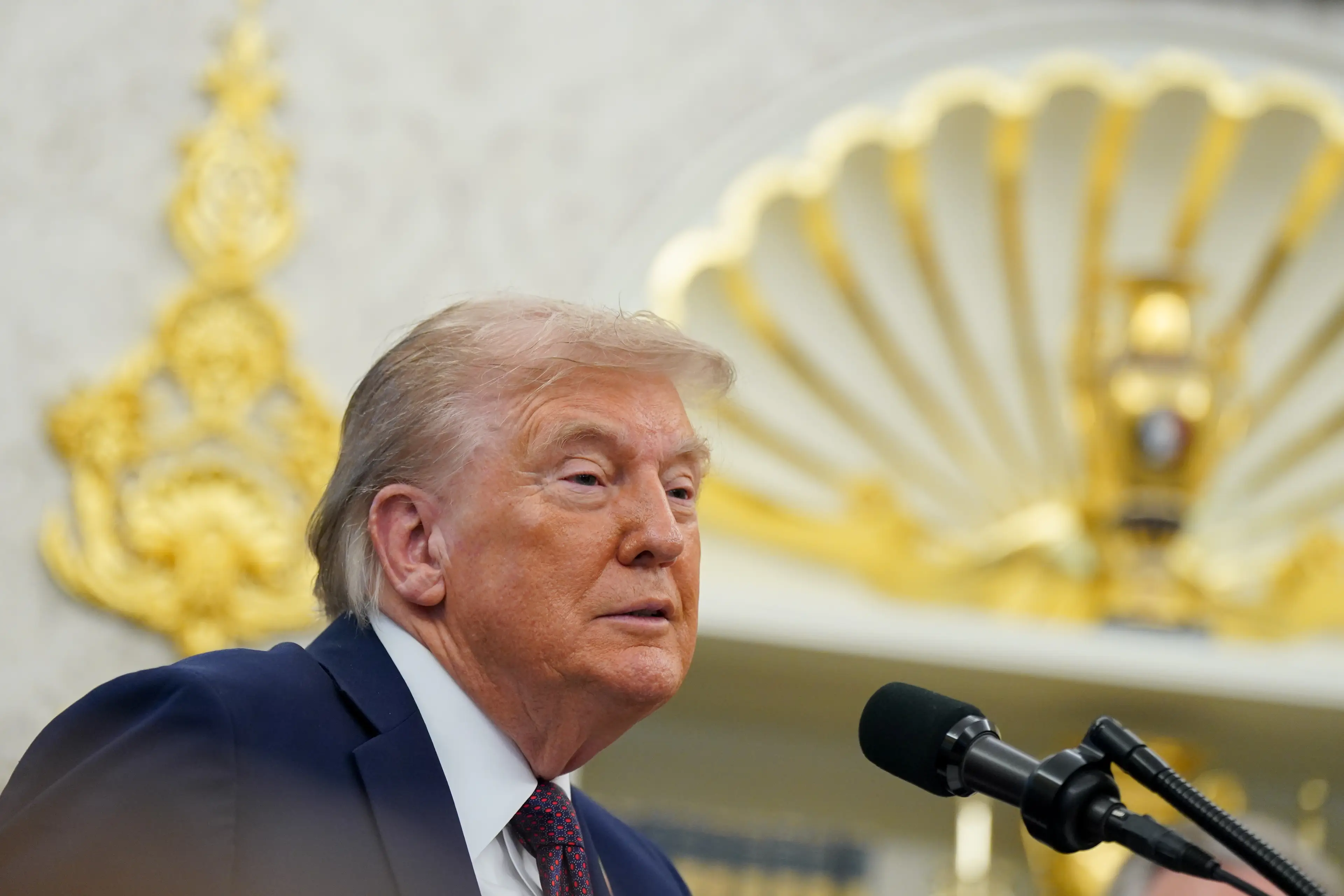 When asked about the rumours of his death Trump kept a 'presidential' face, but there was apparently one giveaway (Al Drago/Bloomberg via Getty Images)