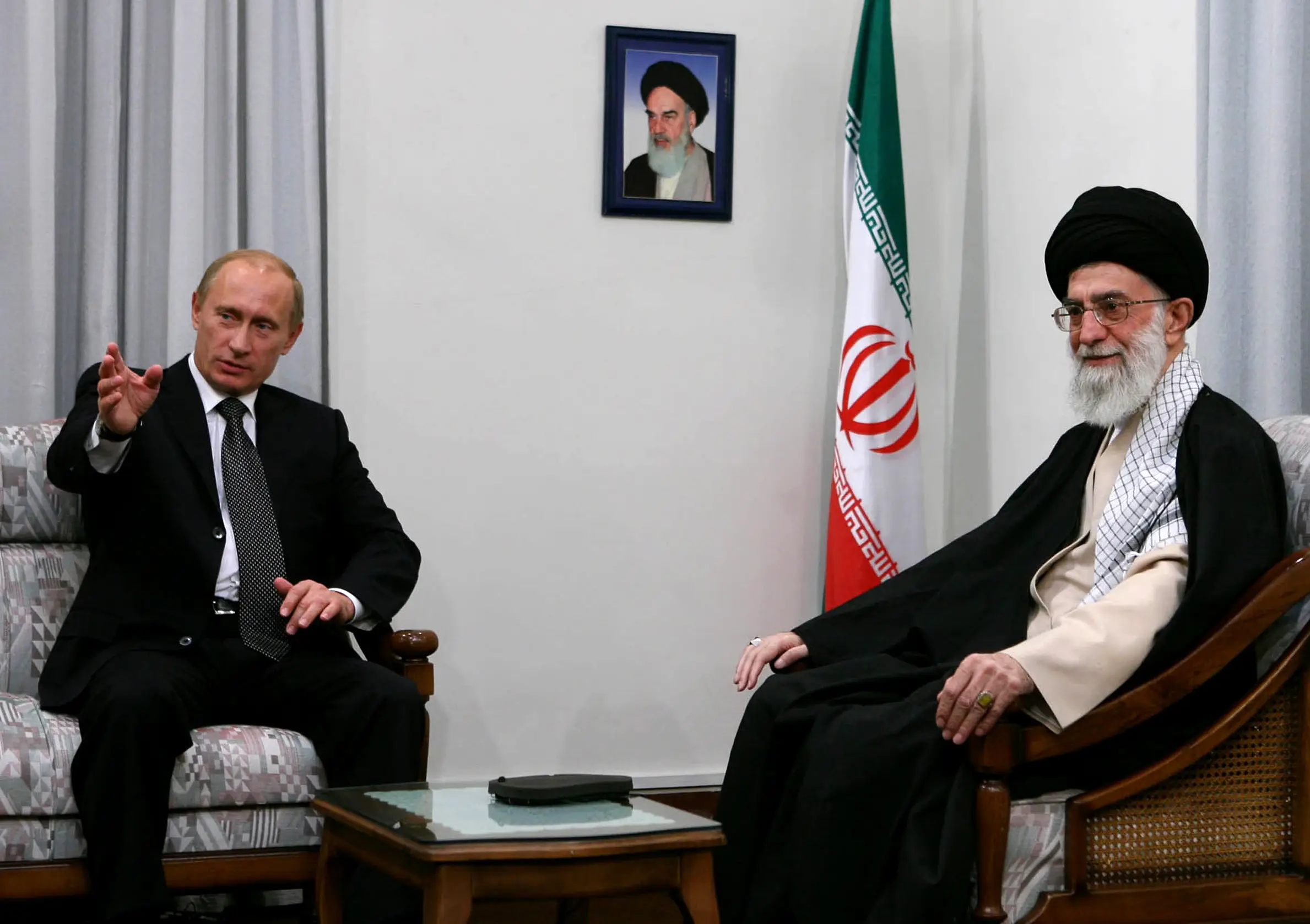 Vladimir Putin and Iran's late supreme leader Ayatollah Ali Khamenei (right) pictured in 2007 (STR/AFP via Getty Images)