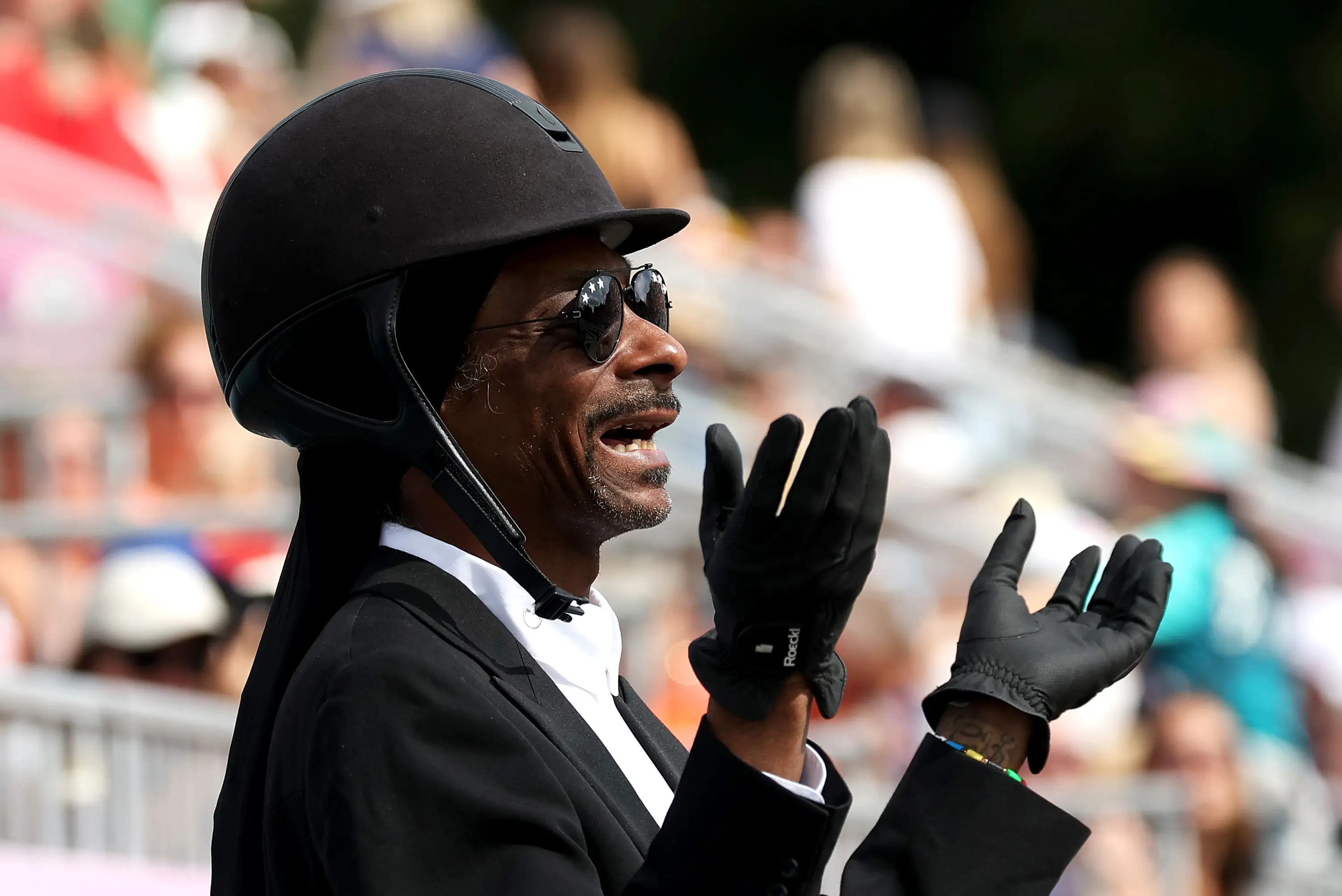 Snoop turned up in full equestrian gear for the dressage team Grand Prix Special. (Mike Hewitt/Getty Images)