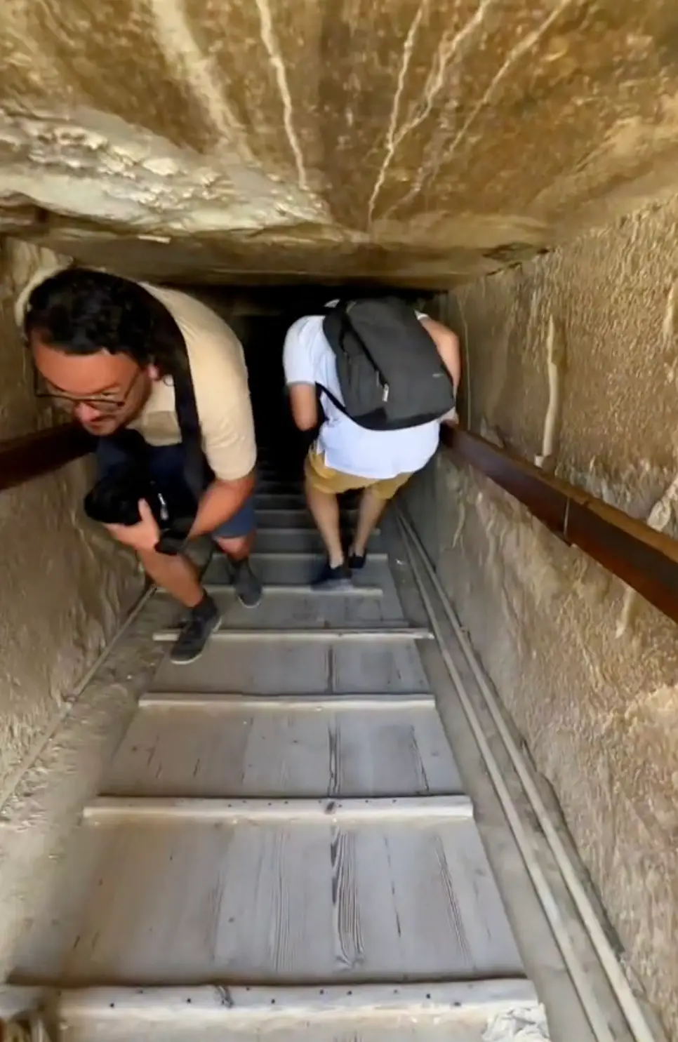 After heading down a steep walkway, visitors then have to seriously stoop over (TikTok/@jessmelu)