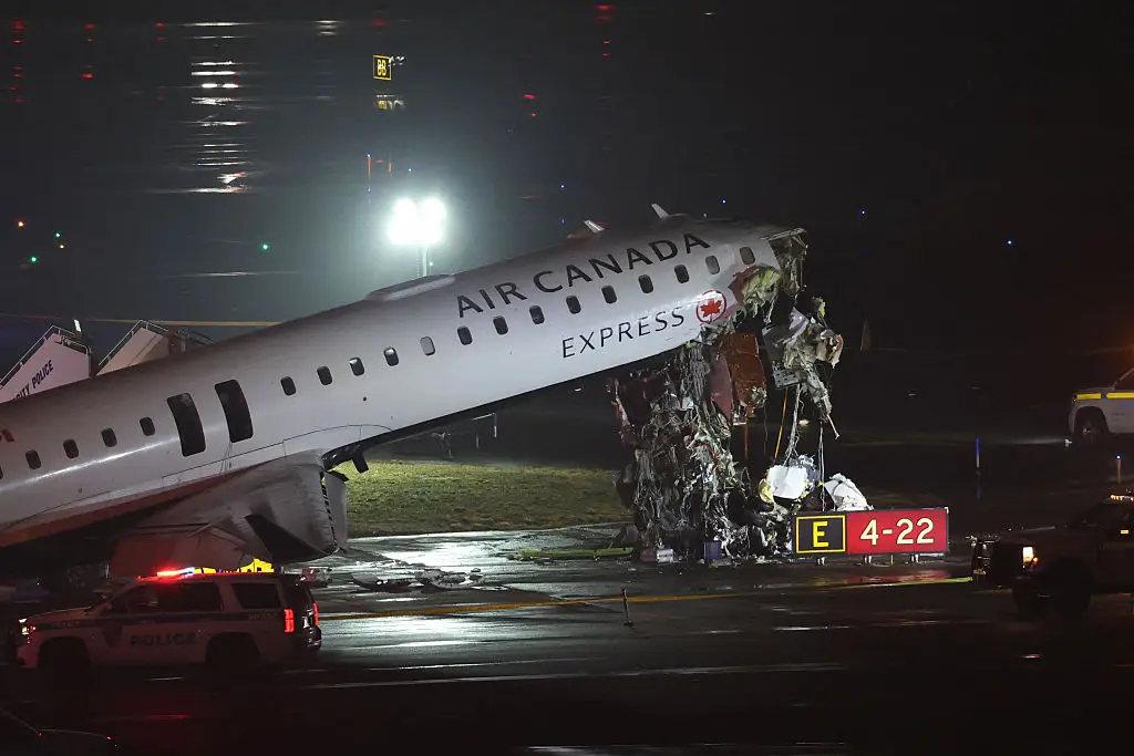 Air Canada Express Flight 8646 operated by Jazz Aviation collided with a fire truck on the runway (ANGELA WEISS / AFP via Getty Images)