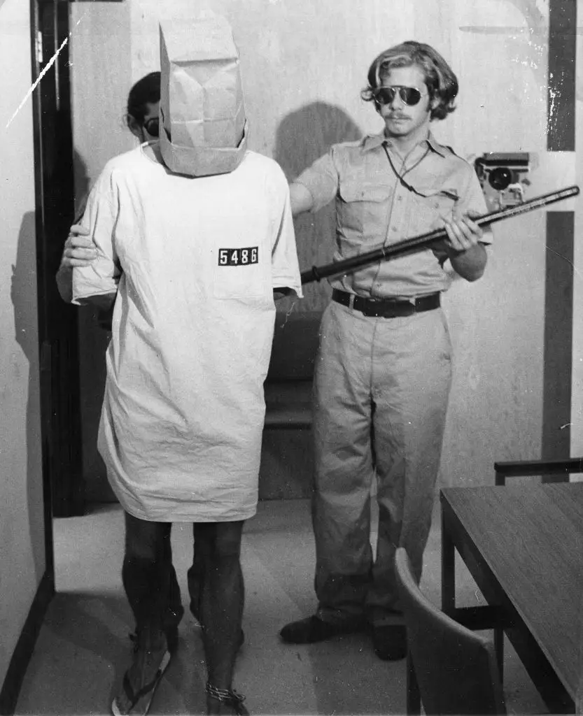 A prisoner and guard in the Stanford Prison Experiment (Duke Downey/San Francisco Chronicle via Getty Images)