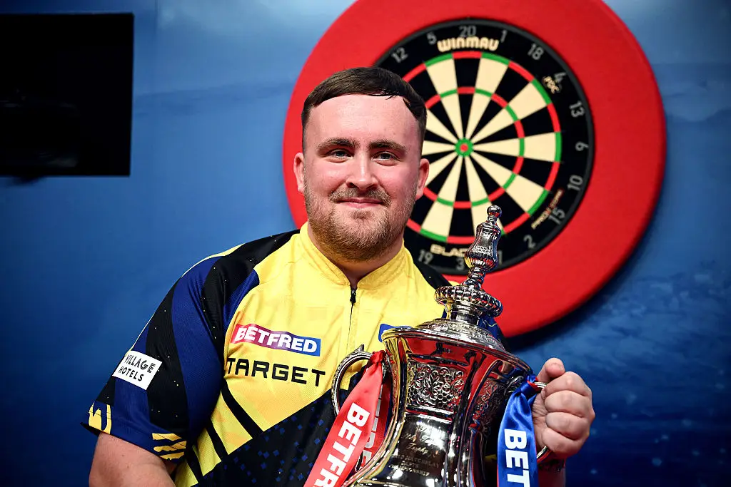 Littler has promised that he won't be going easy on his amateur opponents ( Ben Roberts Photo/Getty Images)