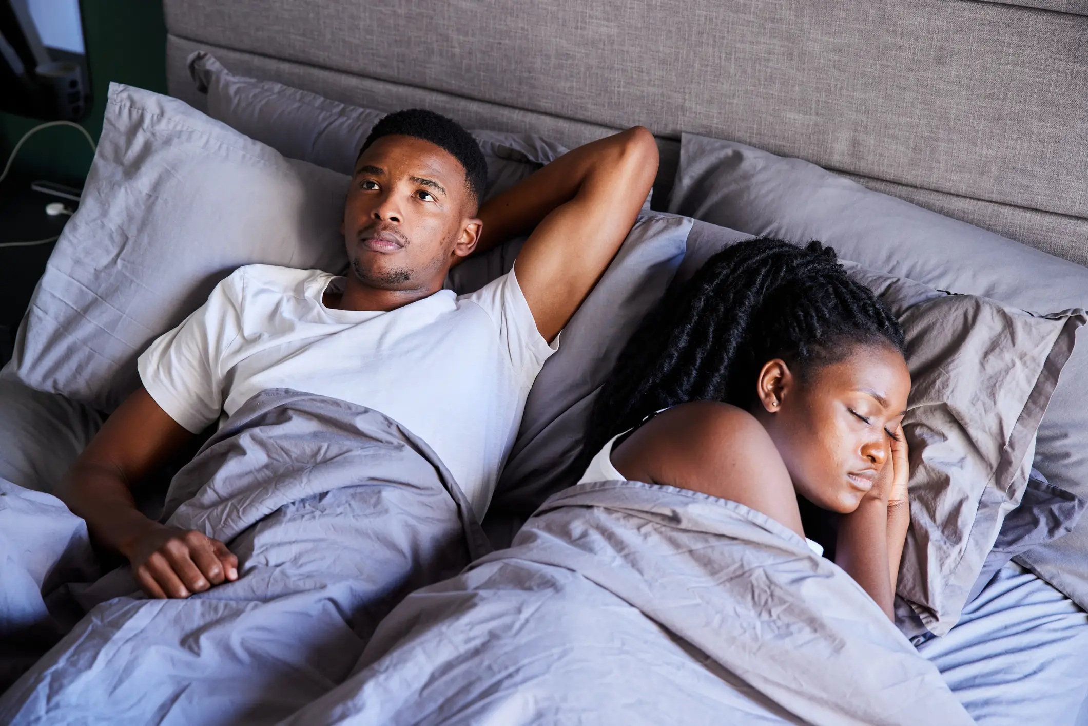 A 'sleep divorce' might be the way forward if you and your partner aren't sleeping well (Getty Stock Image)