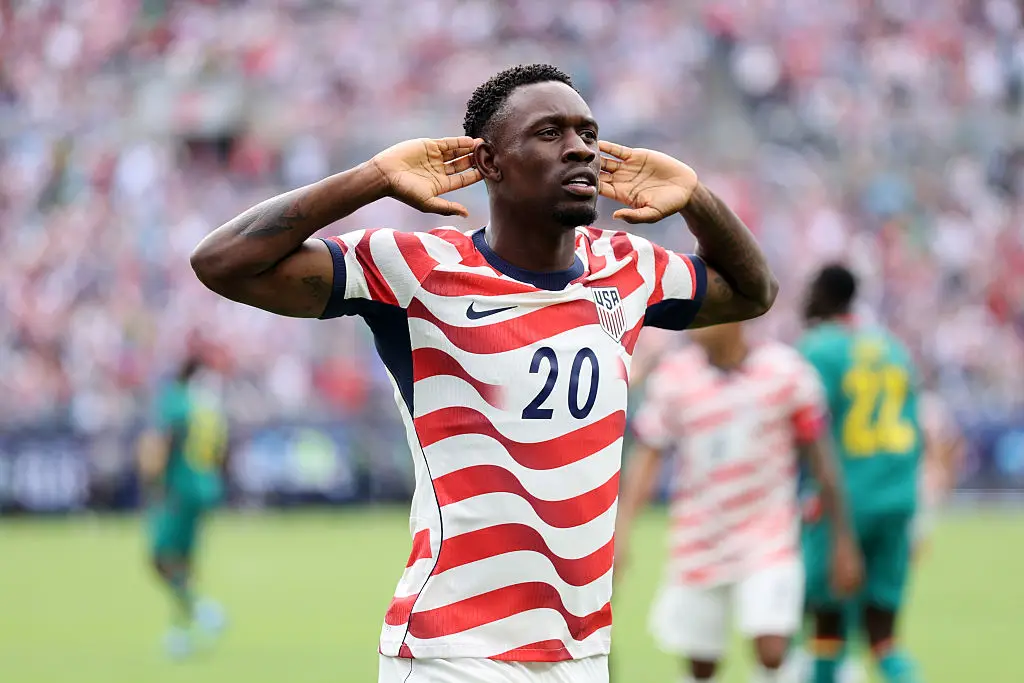 Folarin Balogun celebrates scoring at the World Cup. (Katelyn Mulcahy - FIFA/FIFA via Getty Images)