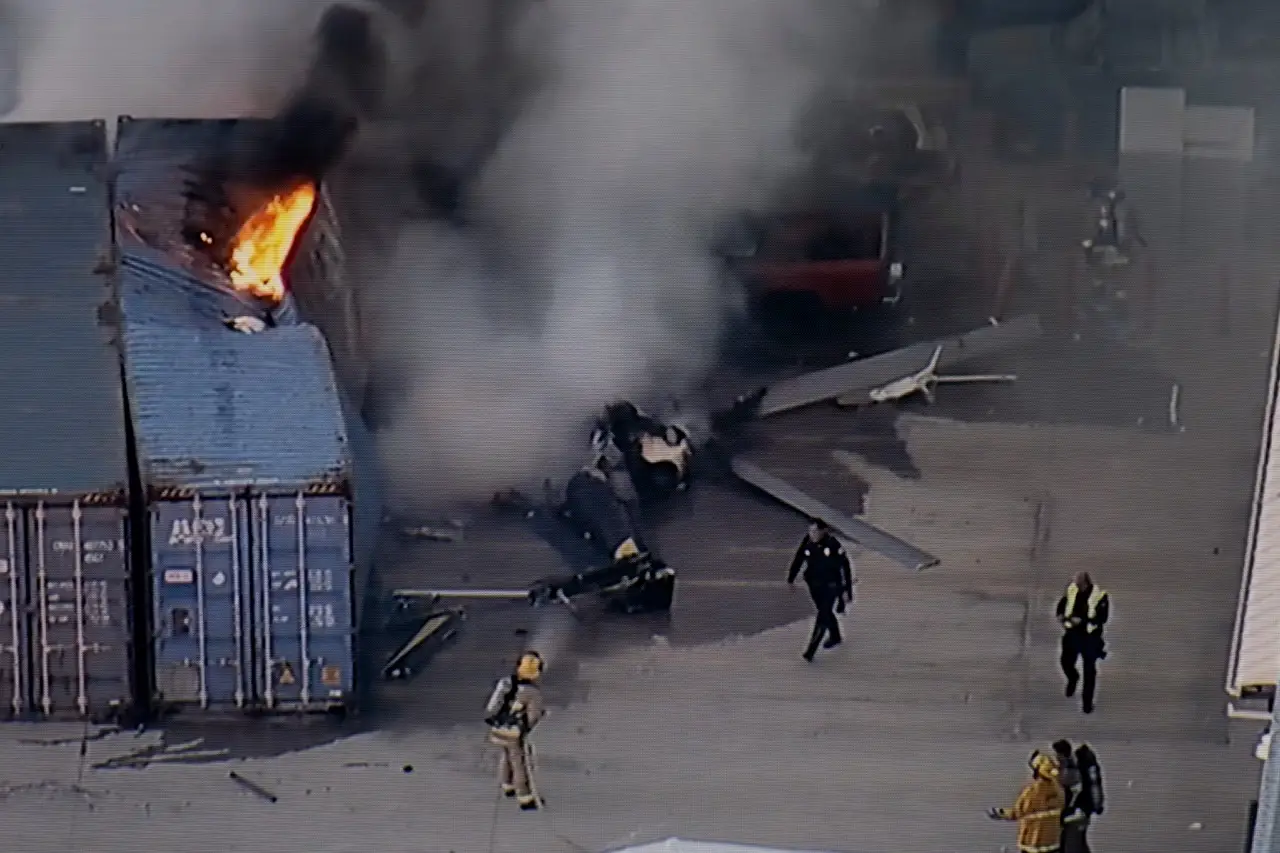 The aircraft crashed in a parking lot close to a self-storage facility in the community of Chatsworth (KABC-TV via AP)