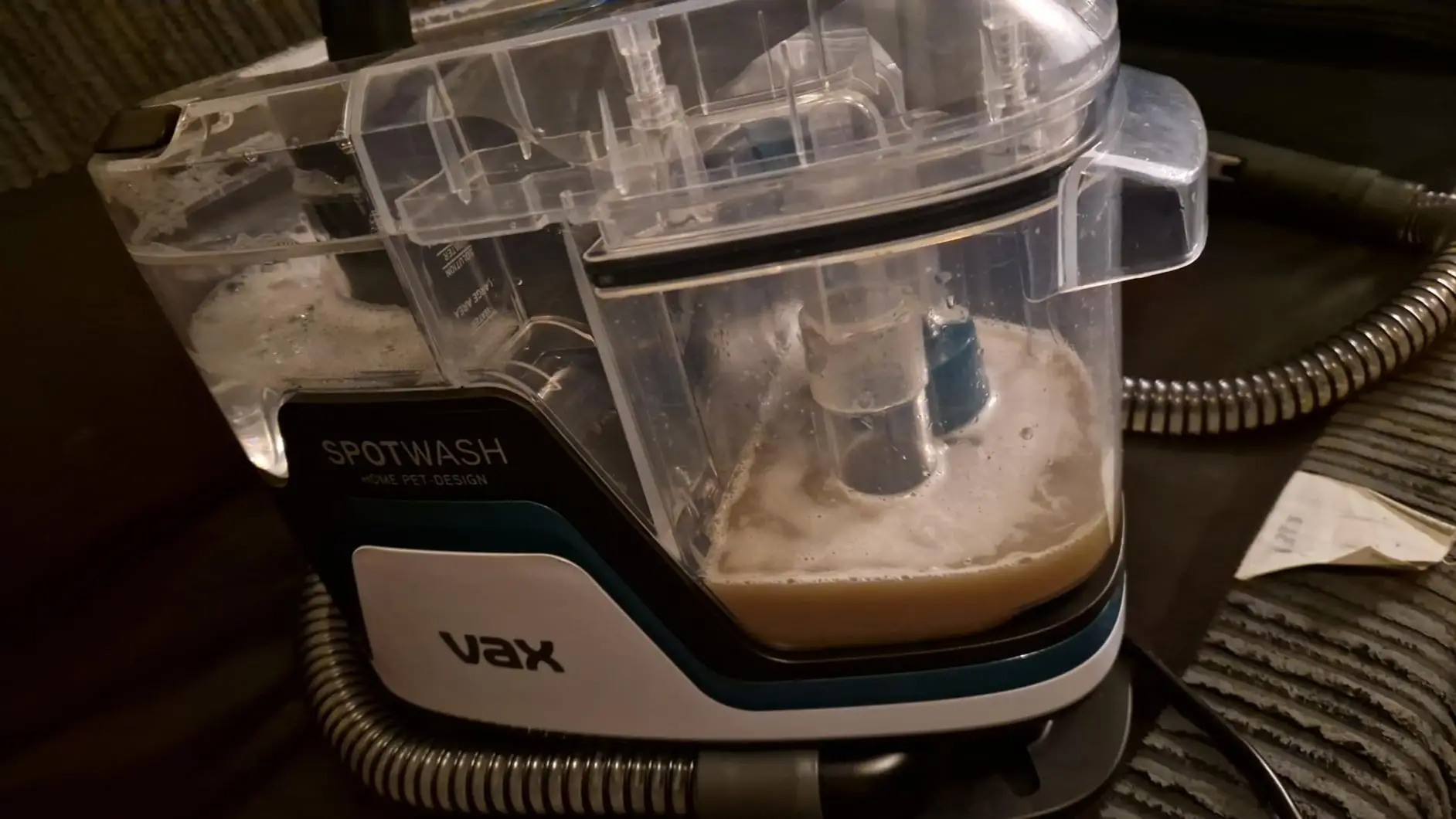 People can't believe the disgusting water this carpet cleaner pulls out of their sofas