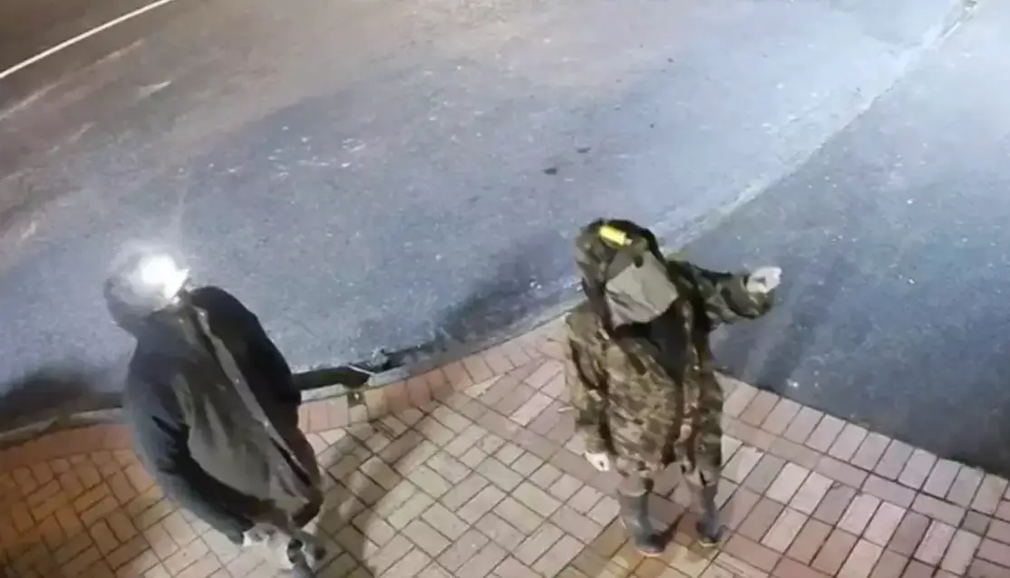 Phillips spotted with one of his children in August 2025 (New Zealand Police)