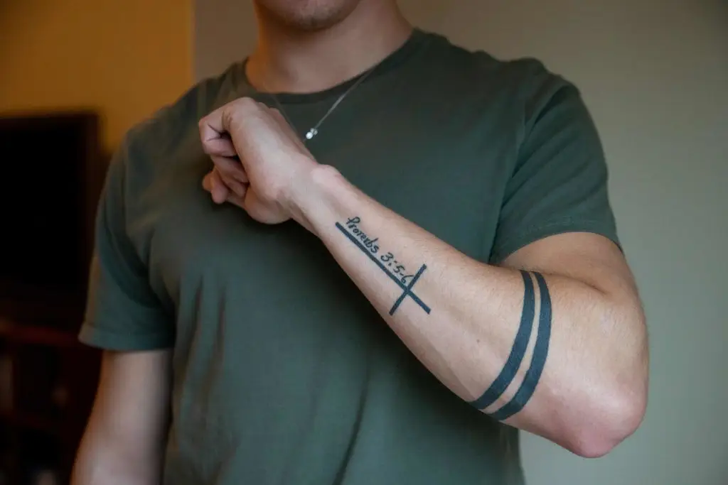 The alleged hidden meaning of two black bands wrapped around the arm has sparked a discussion online (AMANDA ANDRADE-RHOADES/AFP via Getty Images)