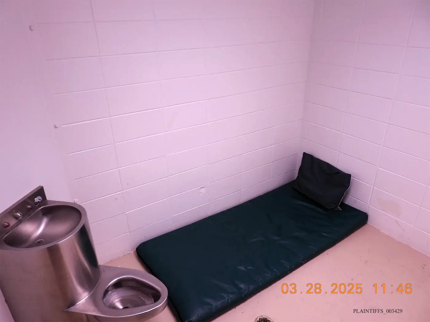 A sink, toilet and bed in solitary confinement (US District Court for the District of Wyoming)