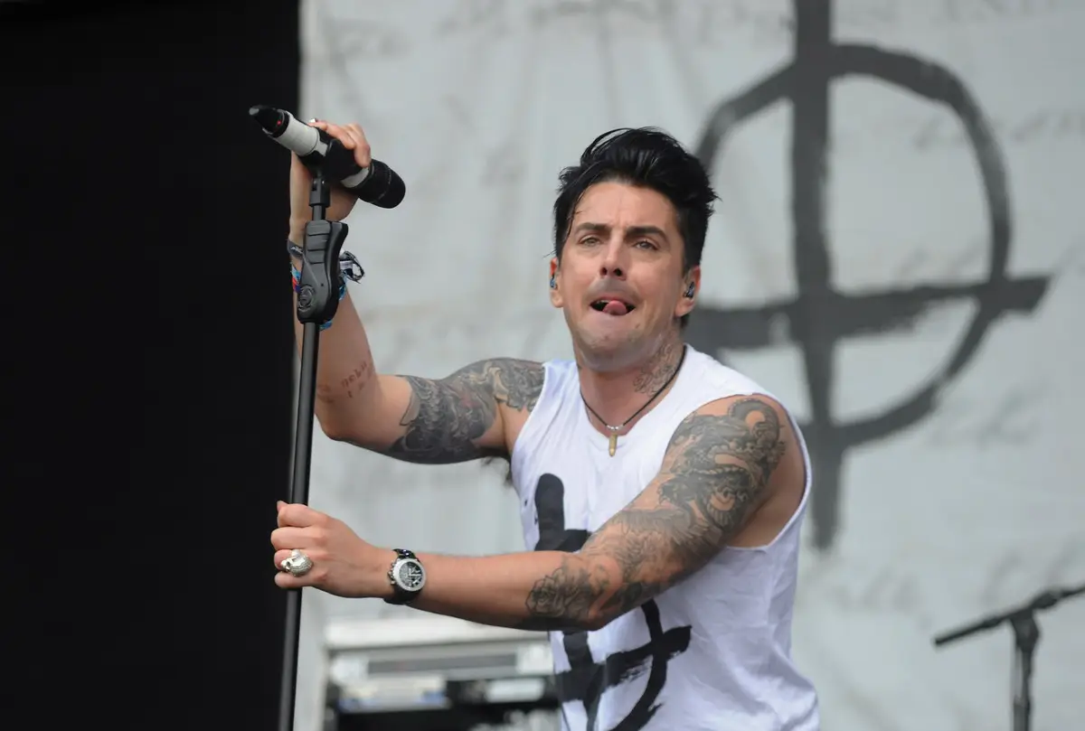 Watkins was the lead singer of rock band Lostprophets.