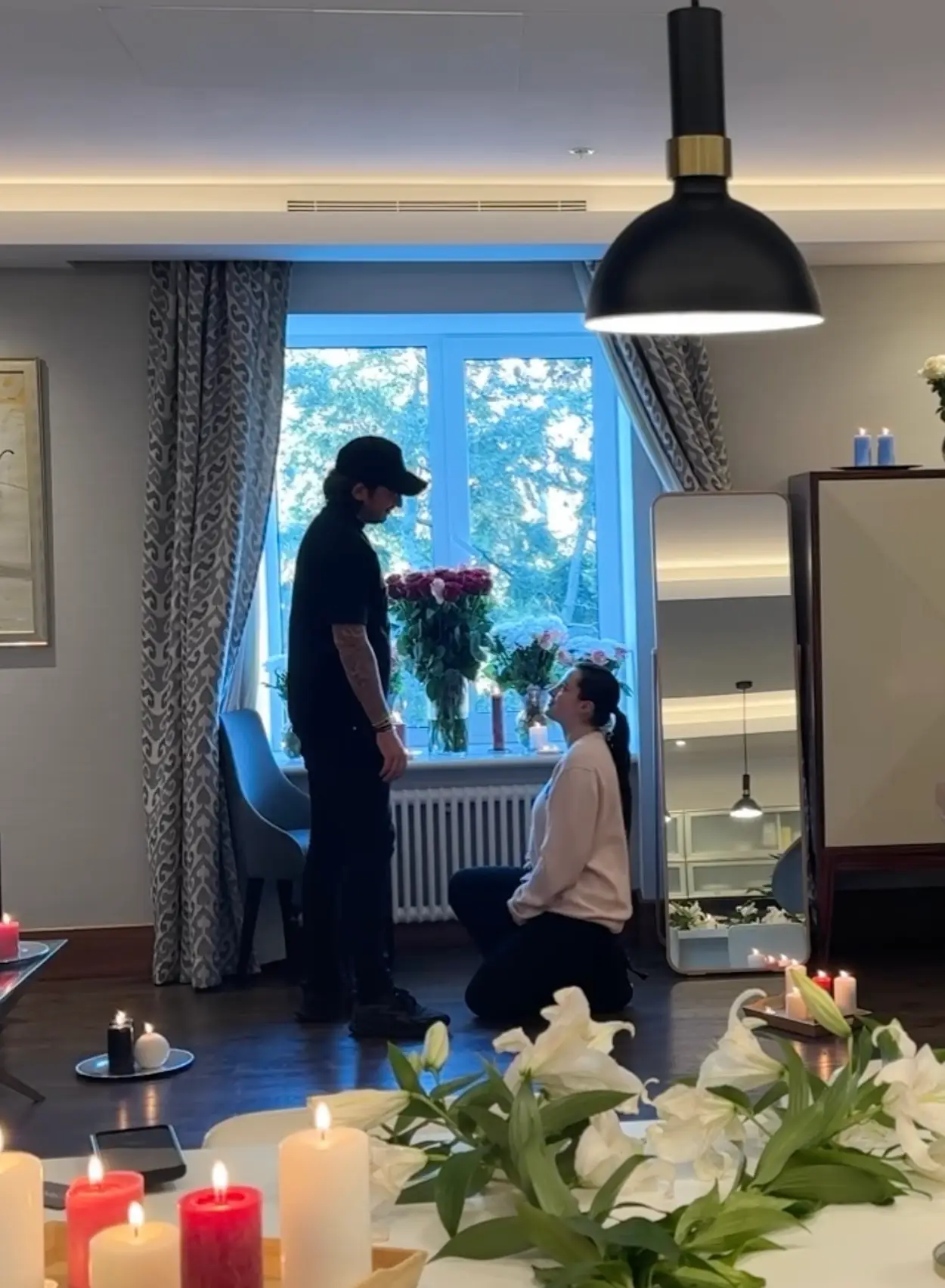 Fans were left baffled by her proposal after she shared footage of the intimate moment on Instagram (Instagram/@bellathorne)