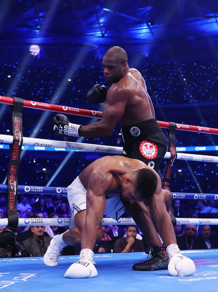 Dubois knocks down Joshua in the first round. (Getty Images)