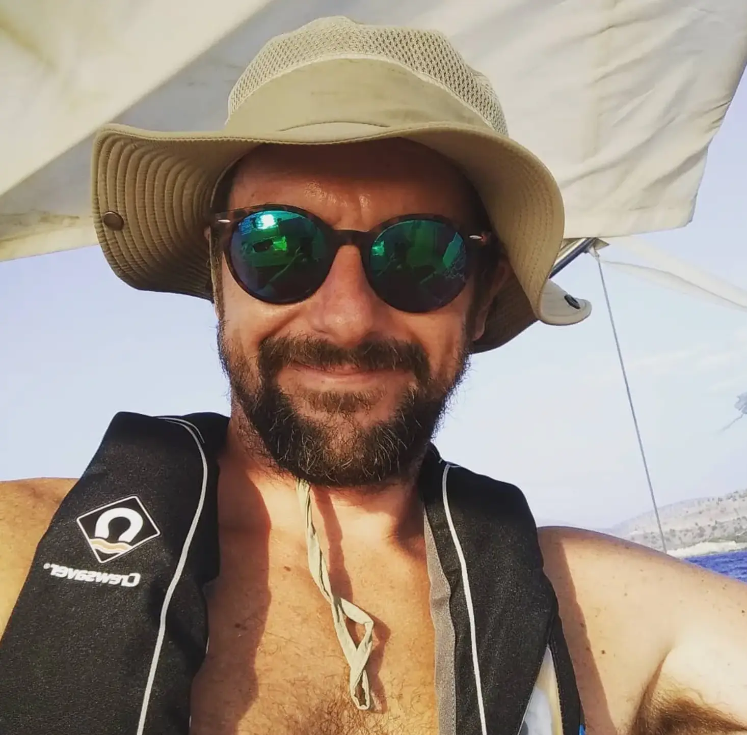 Sailor John Deer ended up swimming with sharks in pitch darkness after falling overboard.