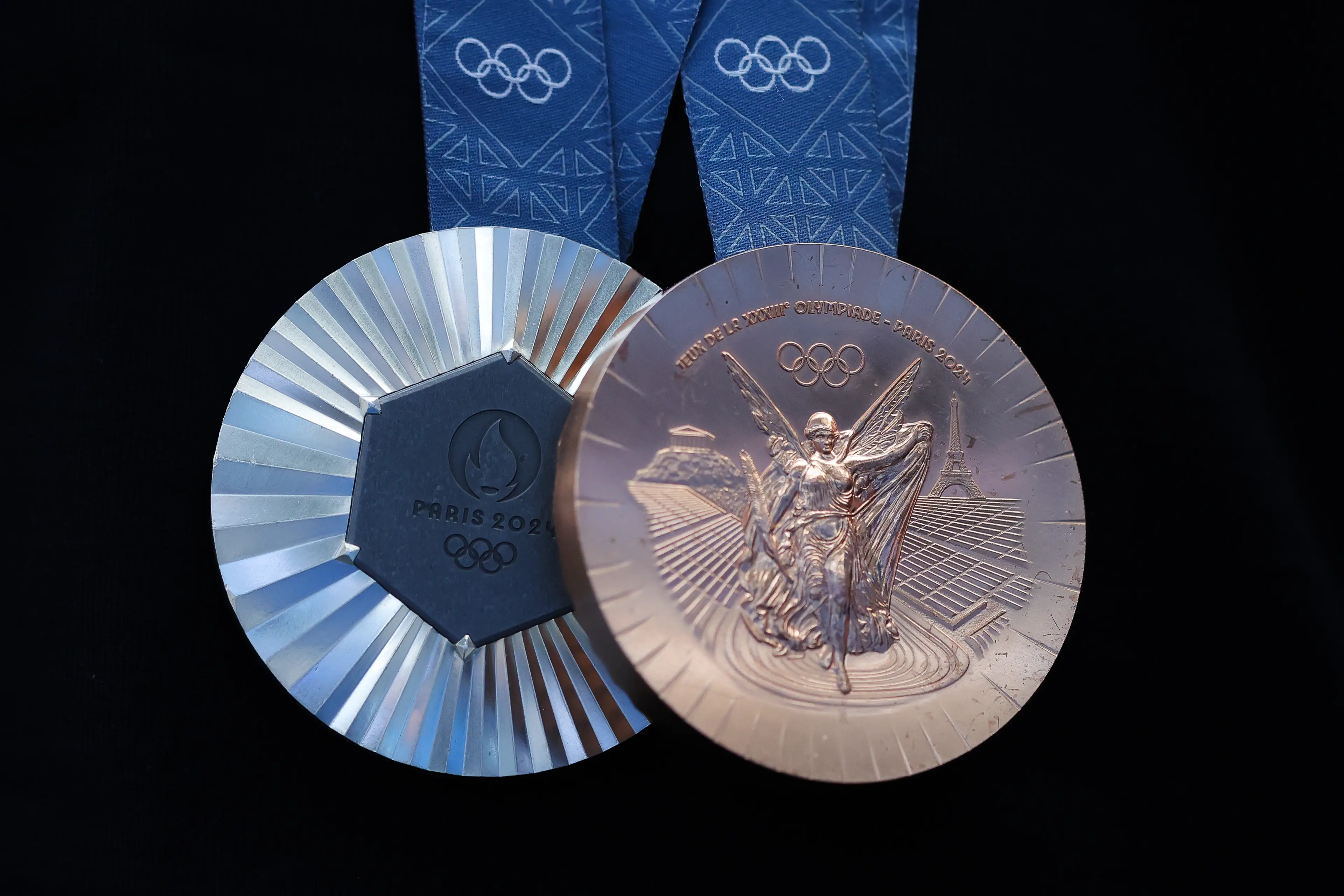 That's a piece of the Eiffel Tower on one side, and a depiction of the Greek goddess of victory on the other (James Gill - Danehouse/Getty Images)