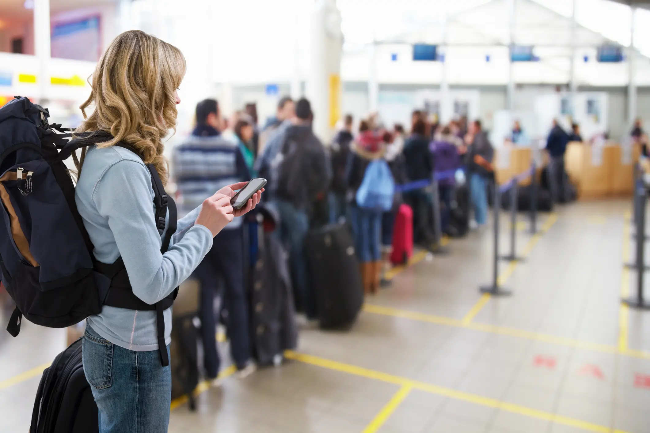 Getting to the check-in desk earlier could work in your favour, according to the ex-flight attendant (Getty Stock Photo)
