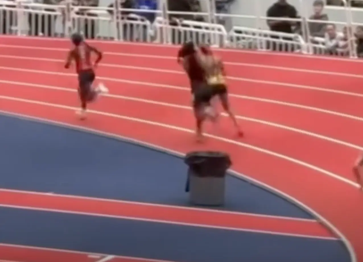 An alternative angle shows the runner holding her arm back before hitting Tucker (WAVY TV 10)