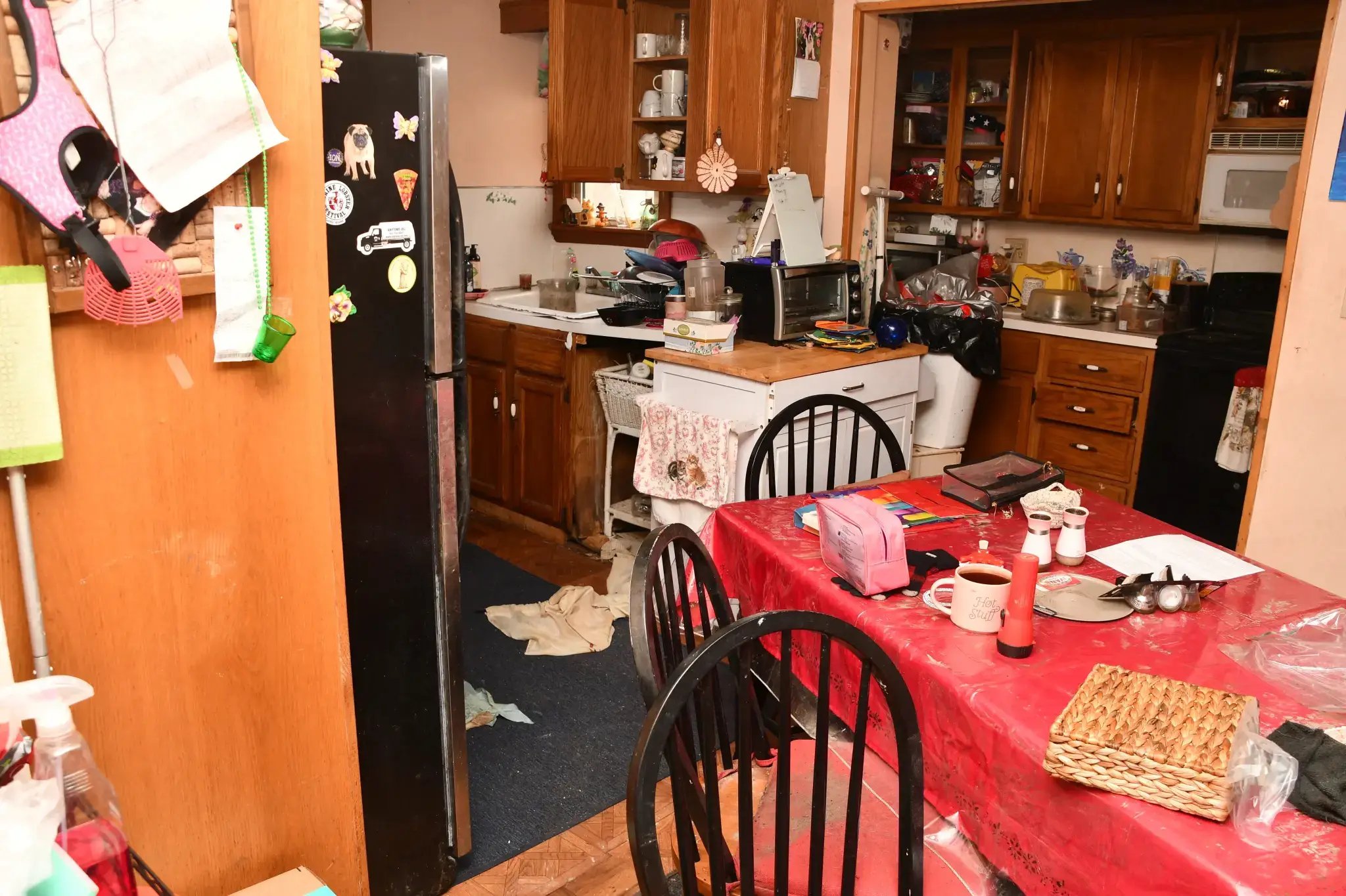 Junk is piled high in most of the rooms (Waterbury Police Department)