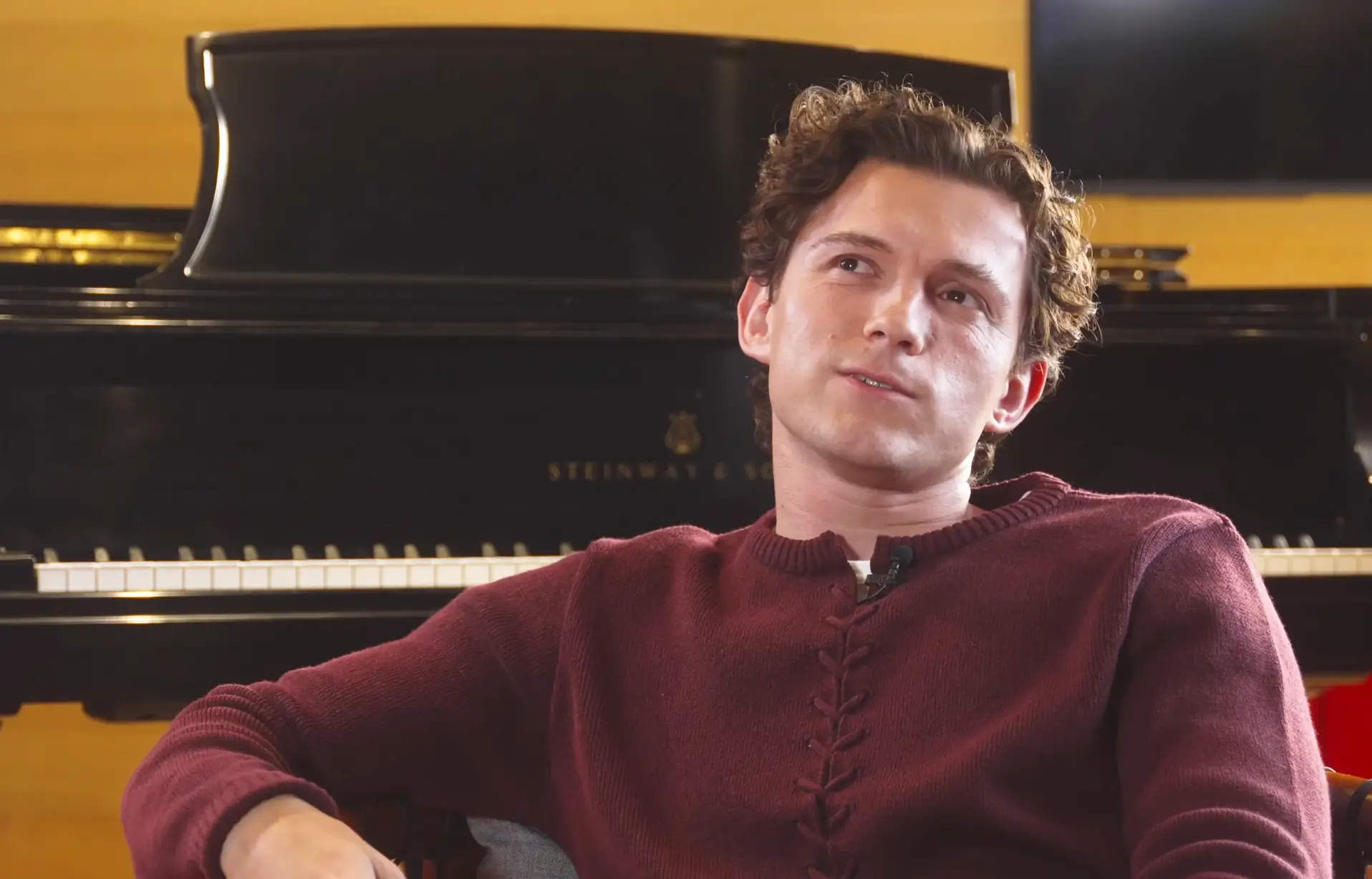 Tom Holland spoke about the idea that he spoils everything in a new interview (YouTube/Josh Horowitz)