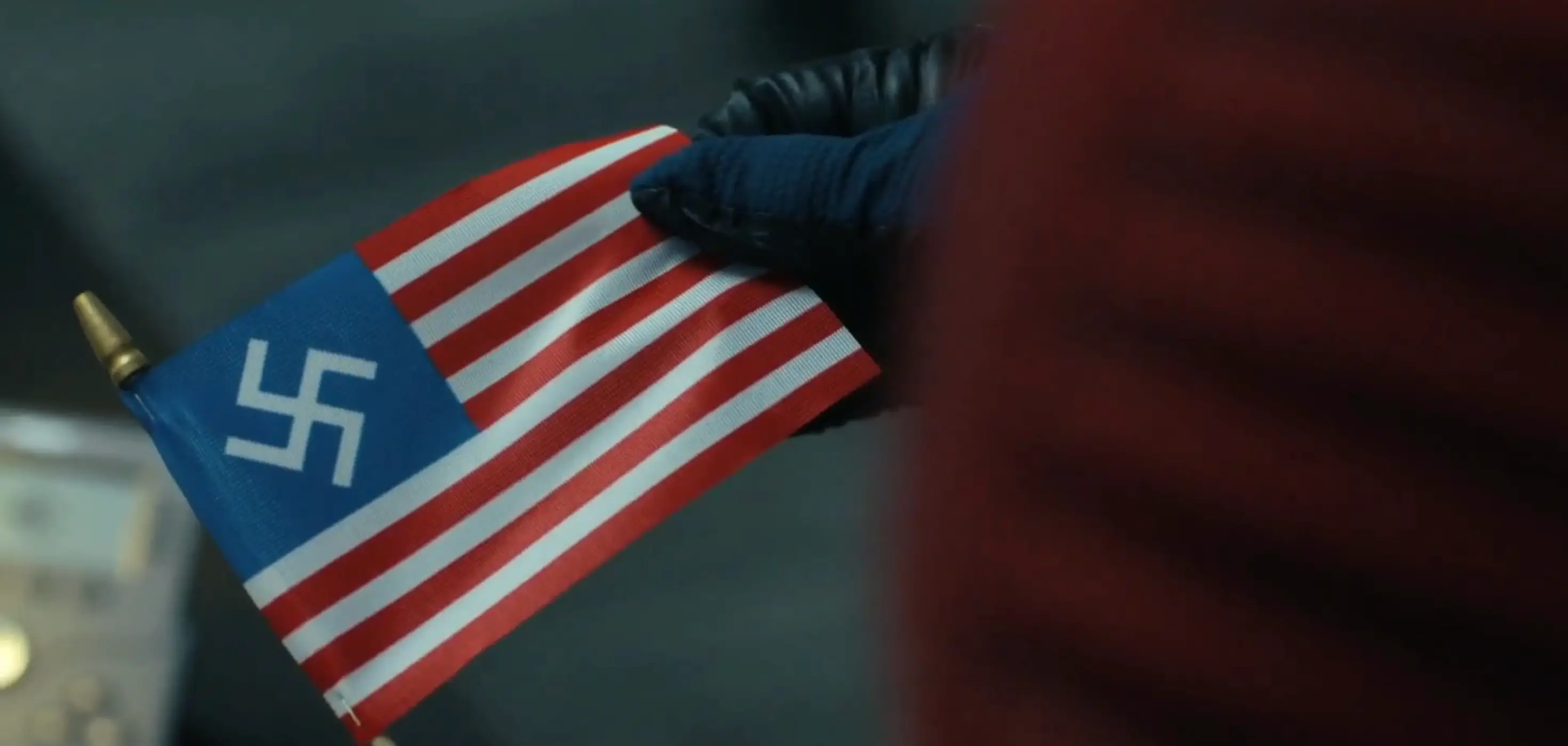 John Cena's Peacemaker discovers the alternate earth he had travelled to was actually a Nazi-ish hell (Warner Brothers)