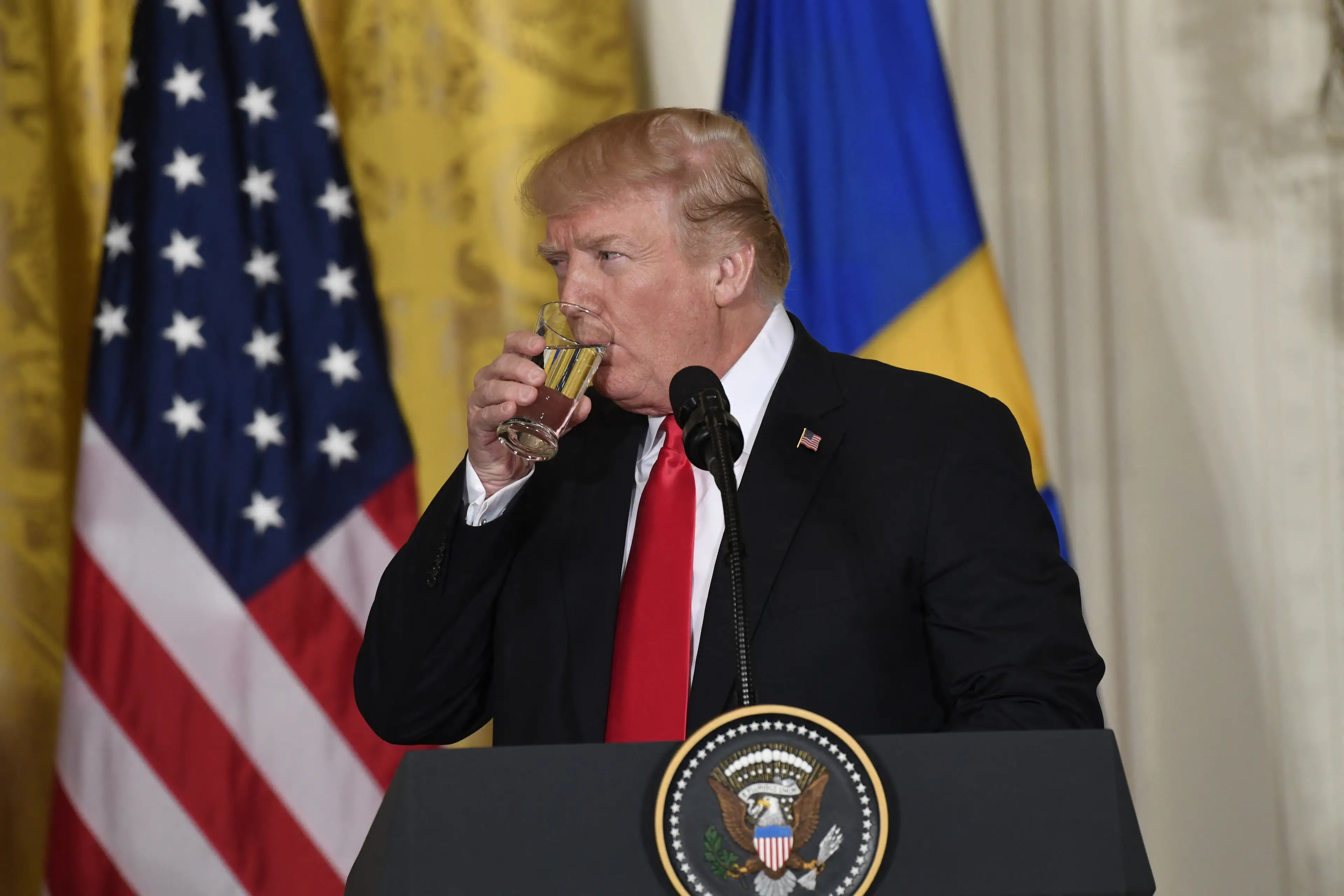 He threatened a whopping 200 percent on alcohol. (SAUL LOEB/AFP via Getty Images)