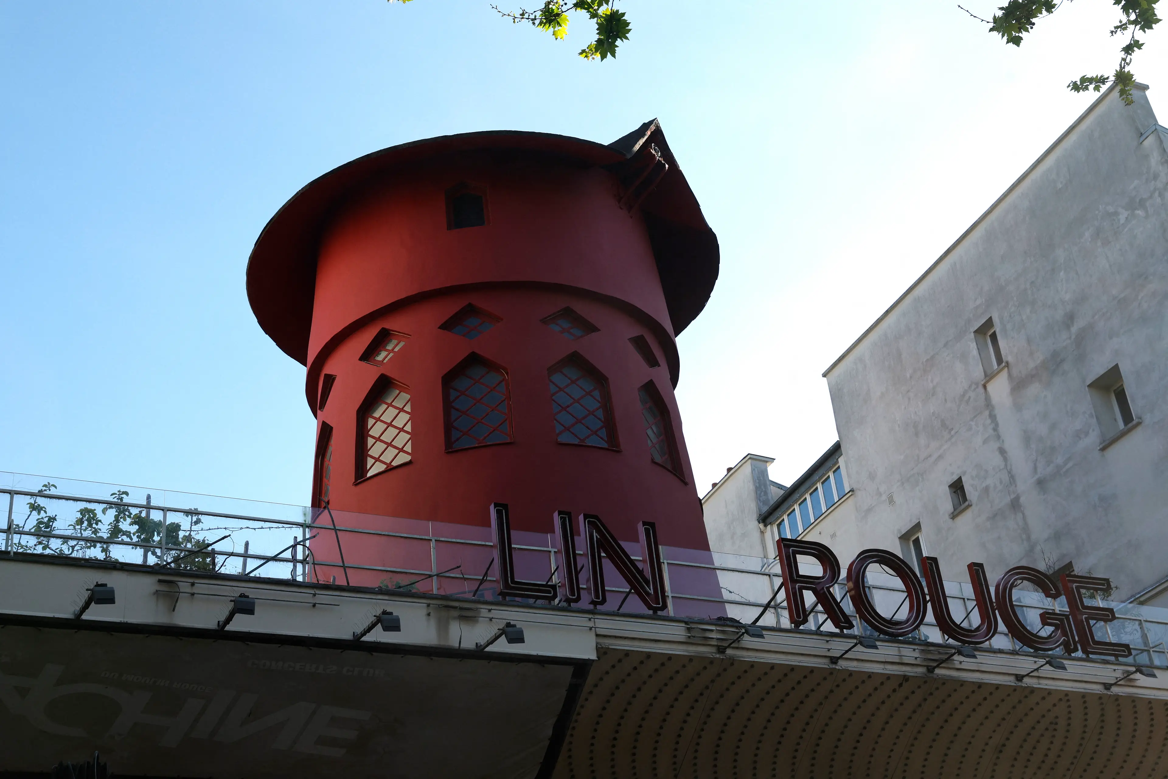 The Moulin Rouge's windmill has fallen off (GEOFFROY VAN DER HASSELT/AFP via Getty Images)