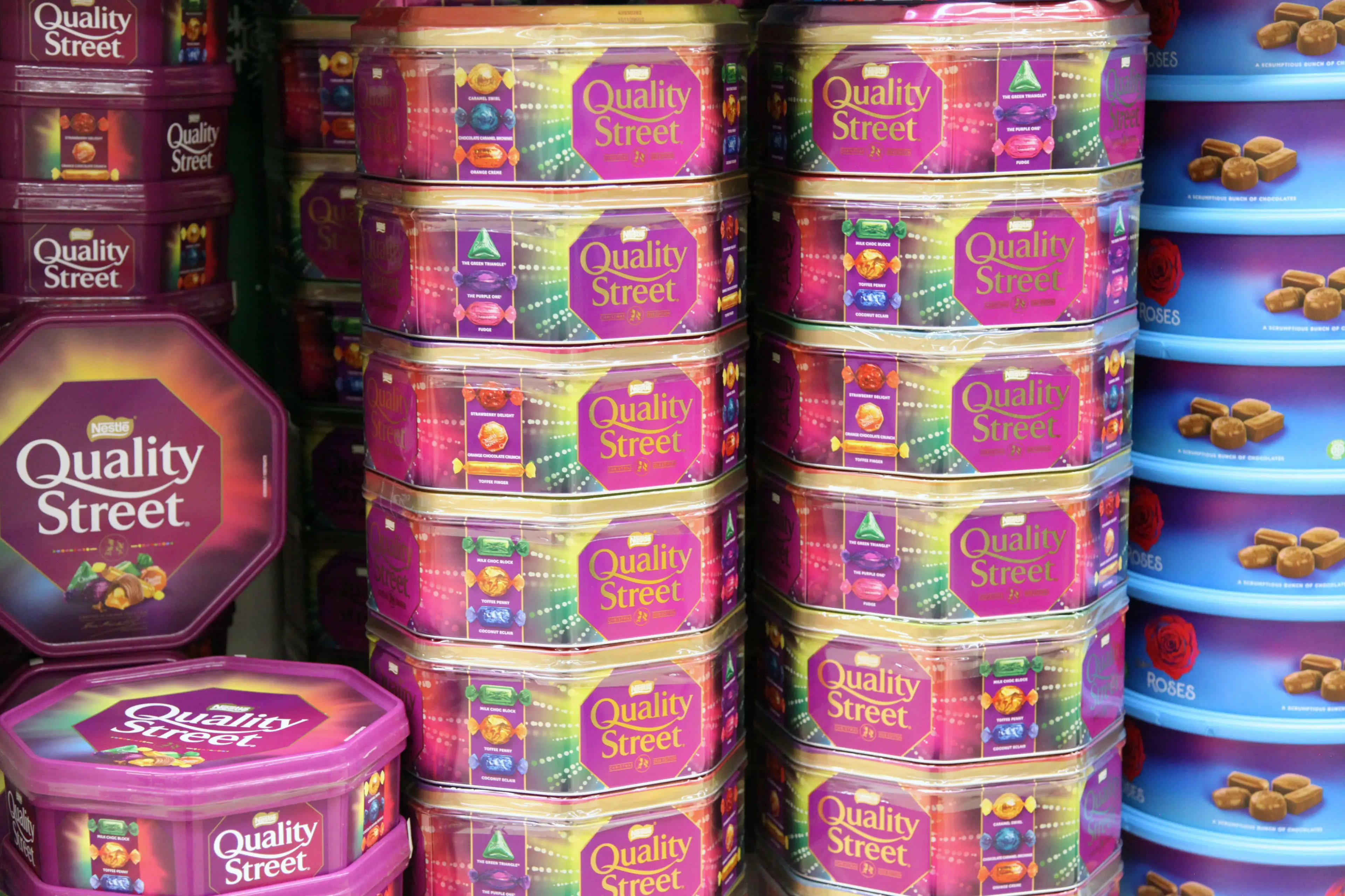 Boxes of chocolates are piled up in supermarkets.