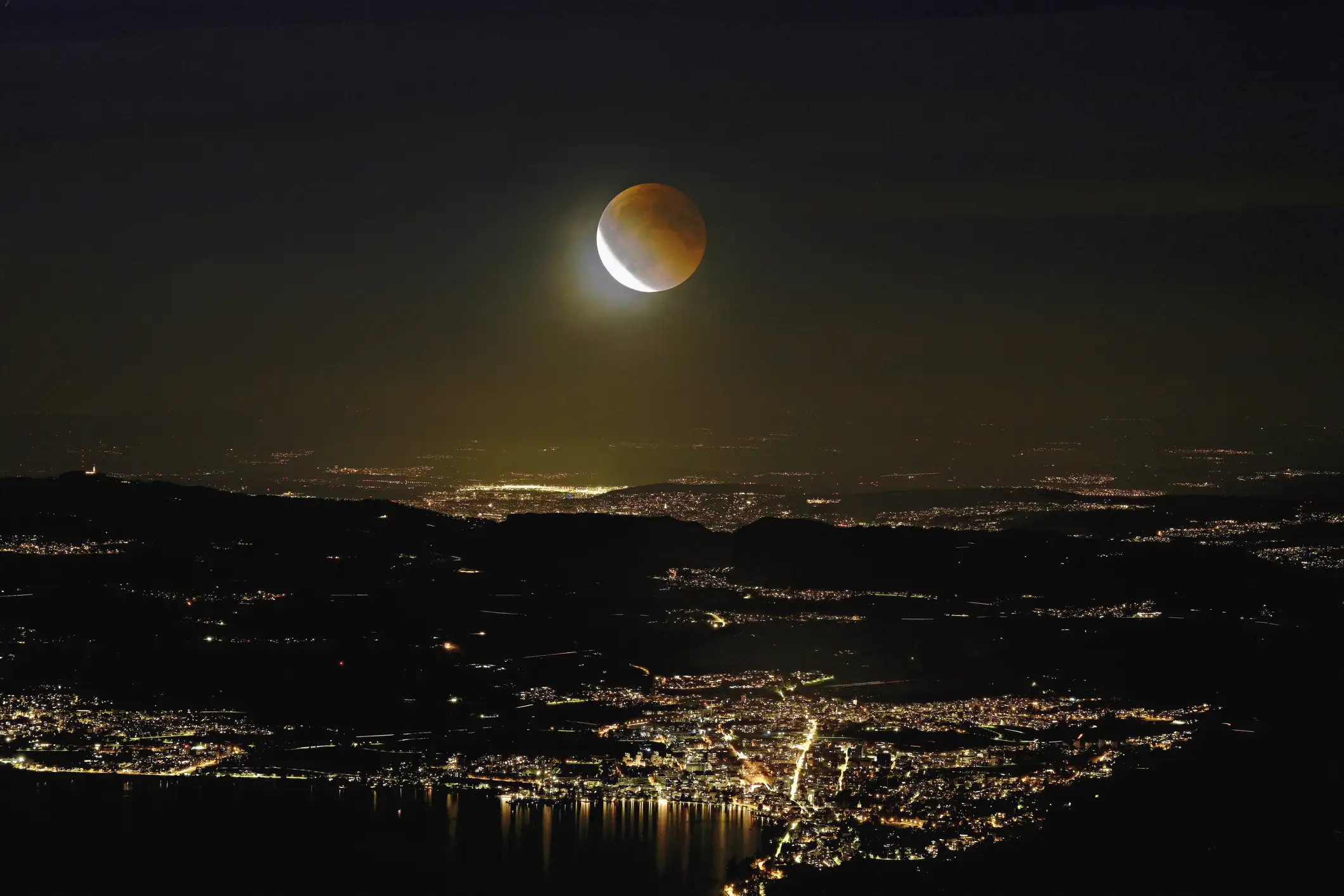 A total lunar eclipse occurs when the Earth gets between the Sun and Moon, so the light hitting the Moon is from the Earth's atmosphere which makes it look red (Getty Stock Photo)