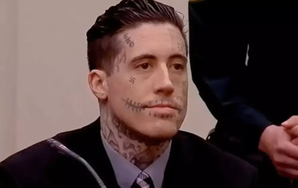 The killer sported an array of face tattoos while in court last year (Cape Coral Police Department)