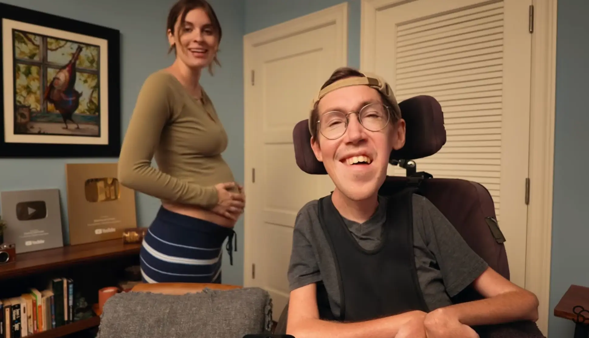 They are expecting their first baby. (@SquirmyandGrubs/YouTube)