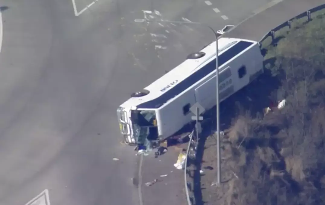 The coach overturned at a roundabout.