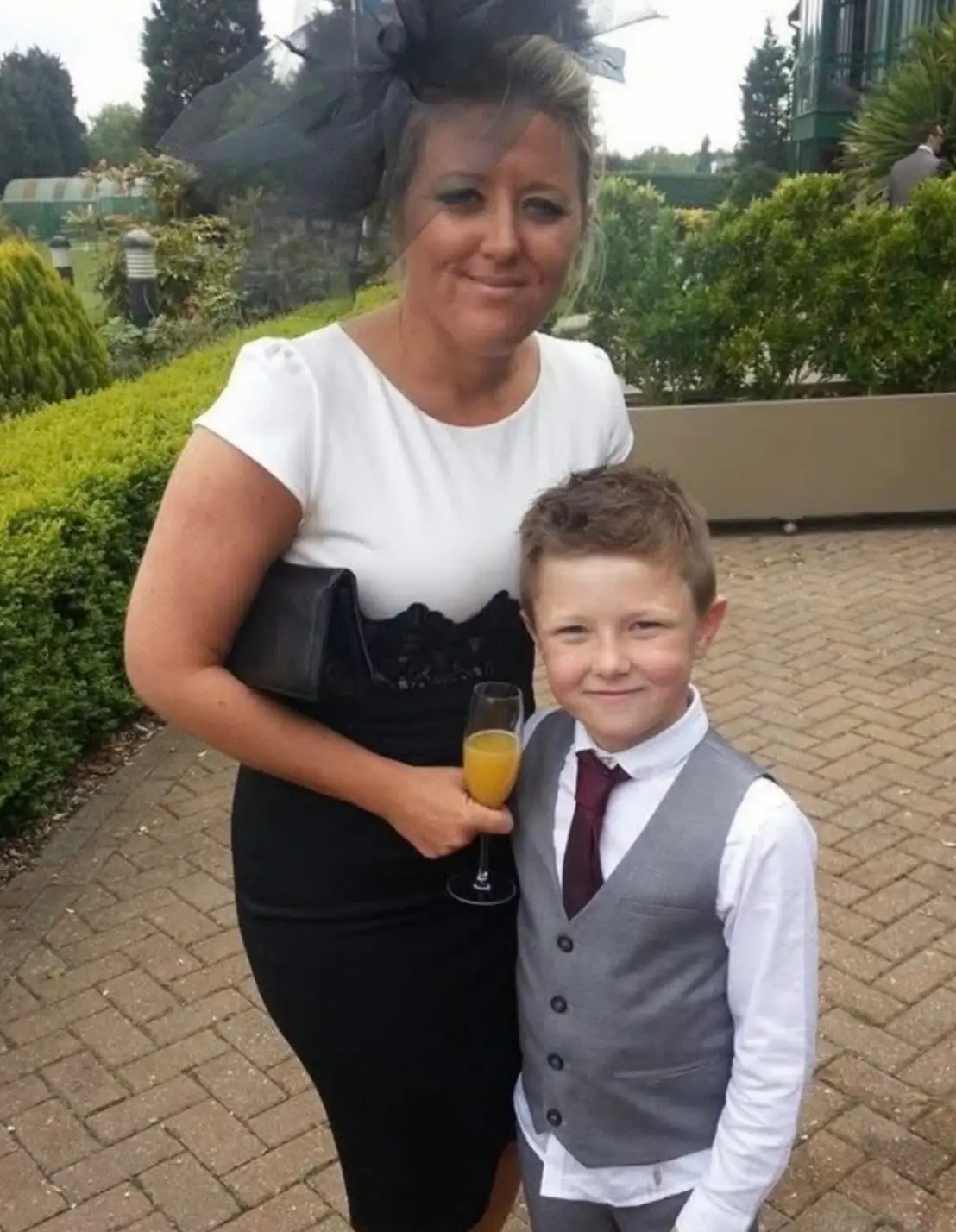 Kelly shared some snaps of her with her beloved godson Henry alongside her moving tribute (Facebook/Kelly Hatchard)