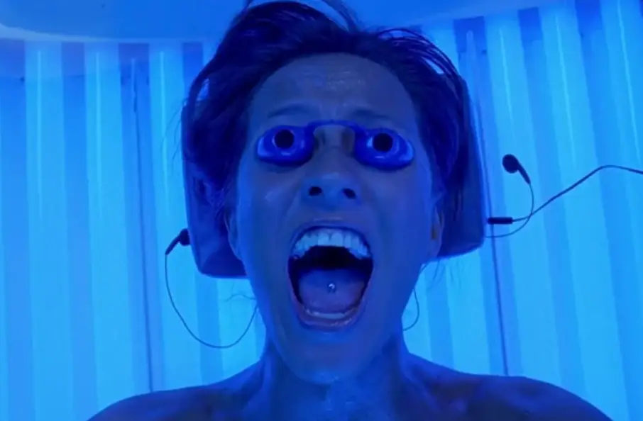 Who could forget THAT tanning machine scene? (New Line Cinema)