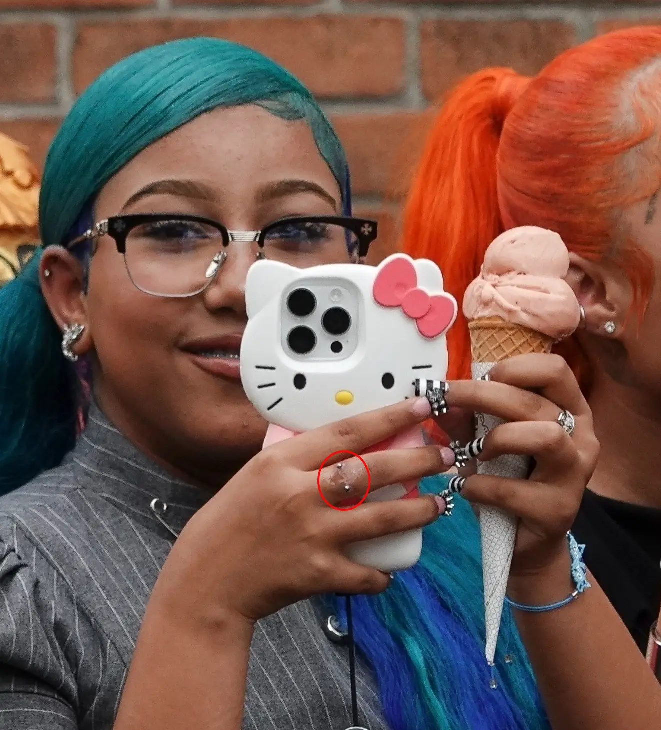 North West appears to have got a finger piercing (COBRA TEAM/BACKGRID)