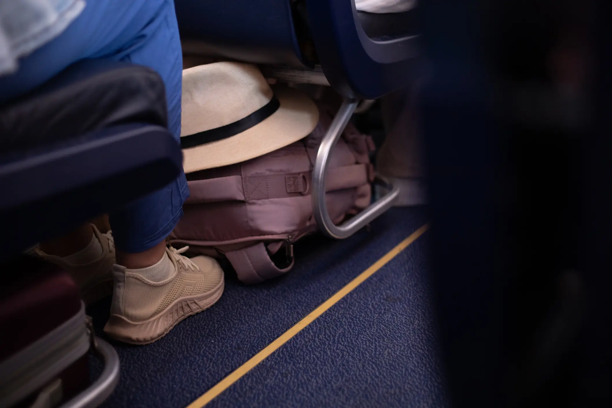One bag can fit under the seat in front (Getty Stock)
