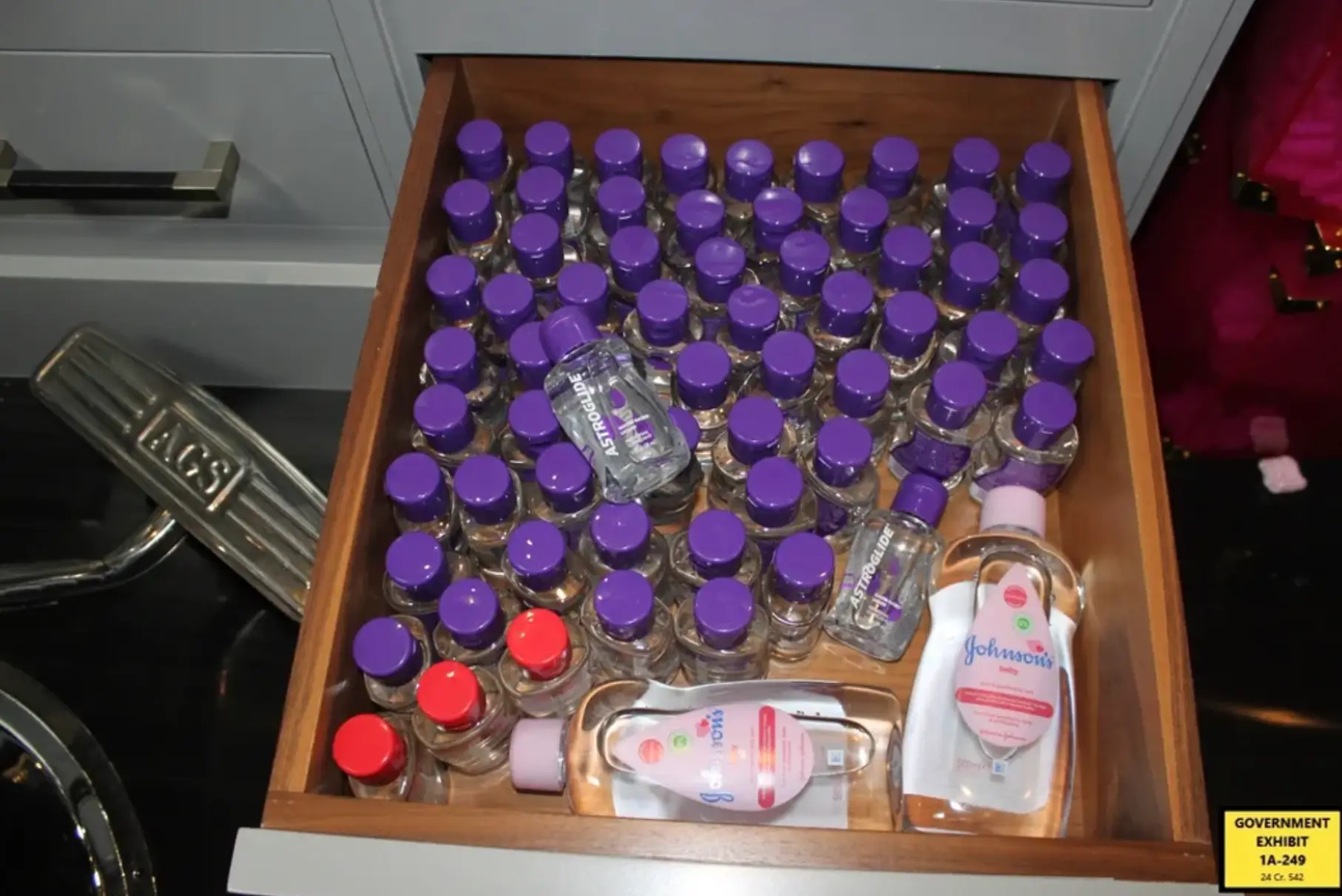 An agent said they found 200 bottles of baby oil and 900 bottles of Astroglide (Department of Justice)