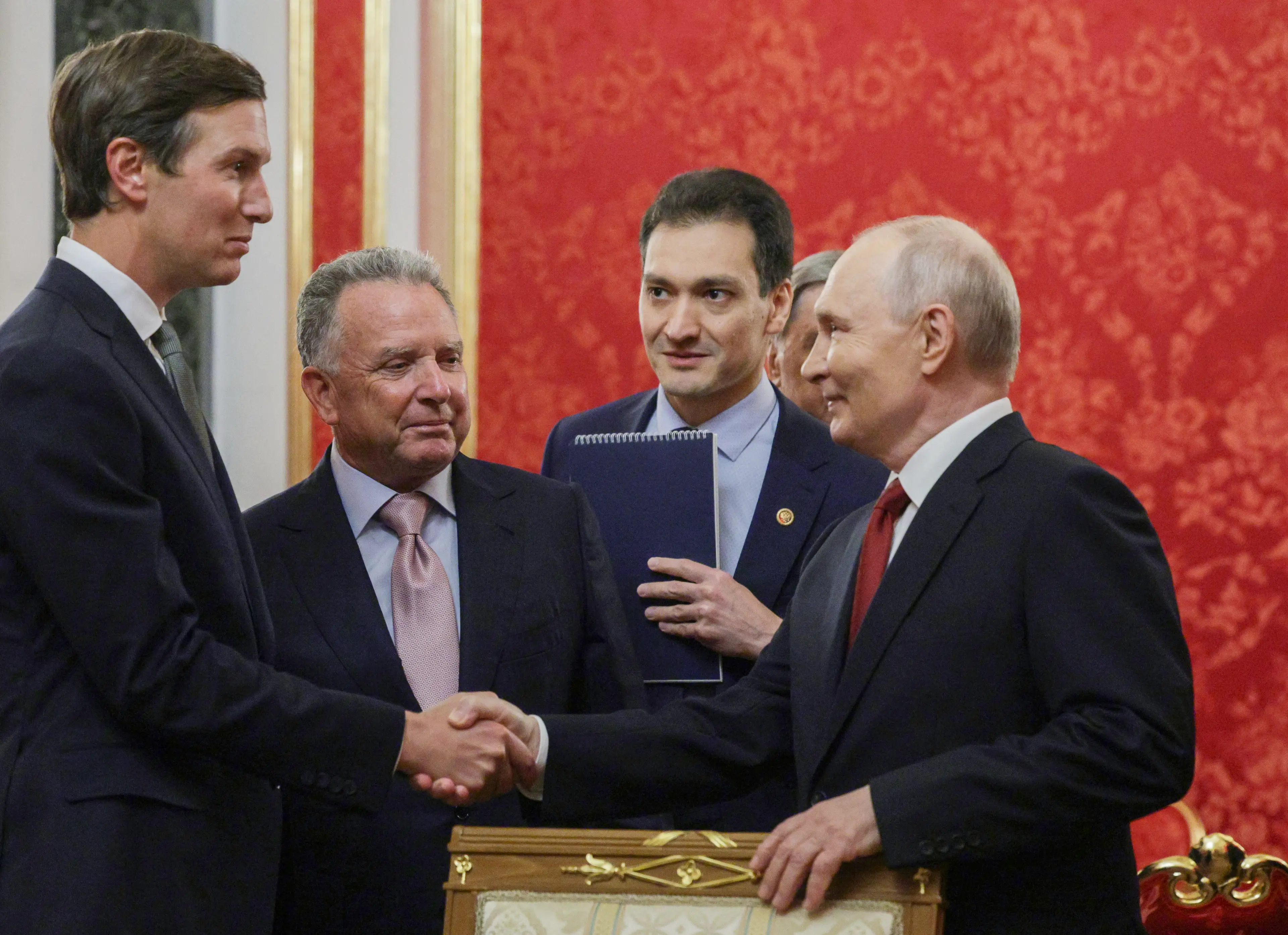 Russia's President Vladimir Putin (R) welcomes US special envoy Steve Witkoff (Getty)