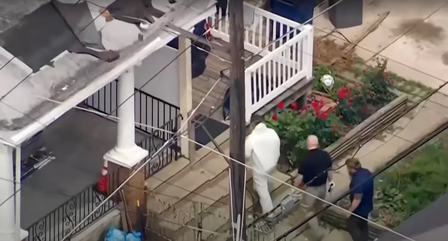 Officers at the house in Philadelphia (NBC News)