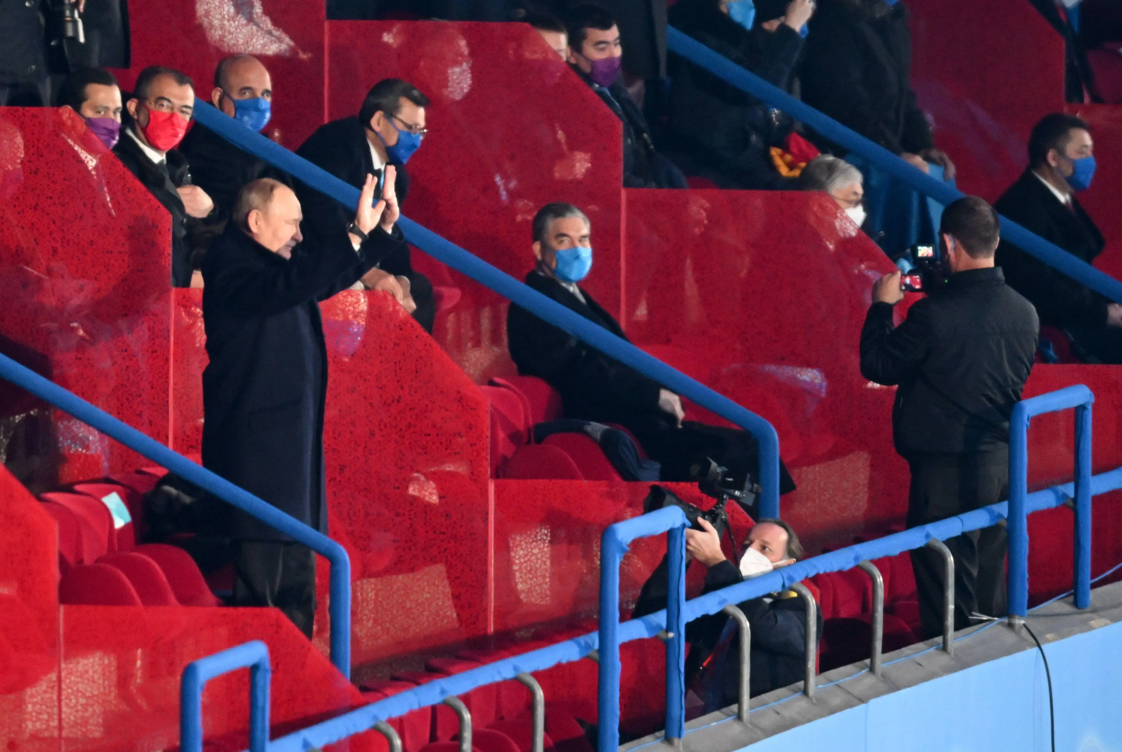 The Russian President waved as his country's team came in.