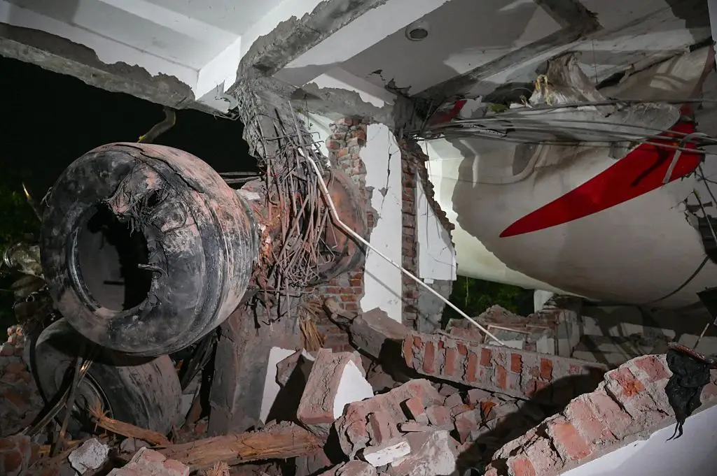 Images taken in the aftermath of the crash show parts of the plane inside B. J. Medical College (Raju Shinde/Hindustan Times via Getty Images)