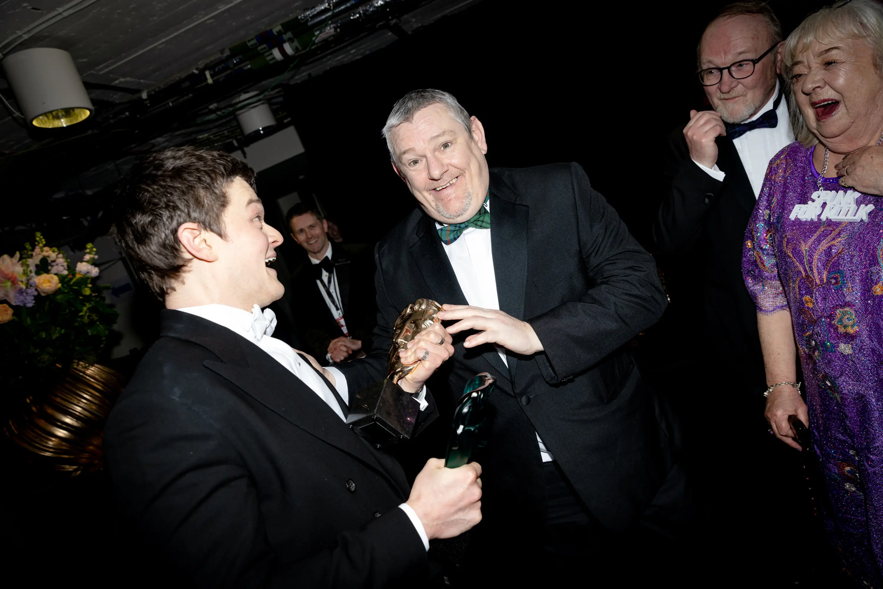 Robert Aramayo and Davidson seen celebrating his BAFTA win (Carlo Paloni/BAFTA via Getty Images)