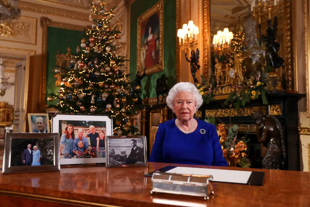 The Queen's Christmas broadcast (pictured in 2019) often had pictures of the Royal Family in it (STEVE PARSONS/POOL/AFP via Getty Images)