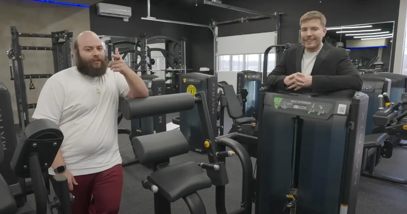 MrBeast has challenged a man to live inside of a gym until he loses 100 pounds, with a cash prize starting at $250,000 (YouTube/Dexerto)