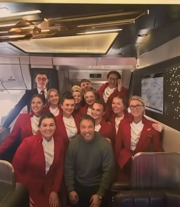 Stephen Graham with cabin crew on the flight (Late Night with Seth Myers/NBC)