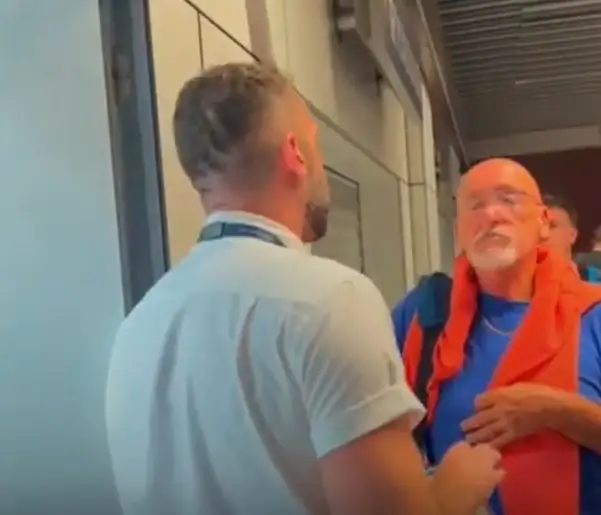 Ryanair passengers were seen arguing with airport staff as they tried to get home.