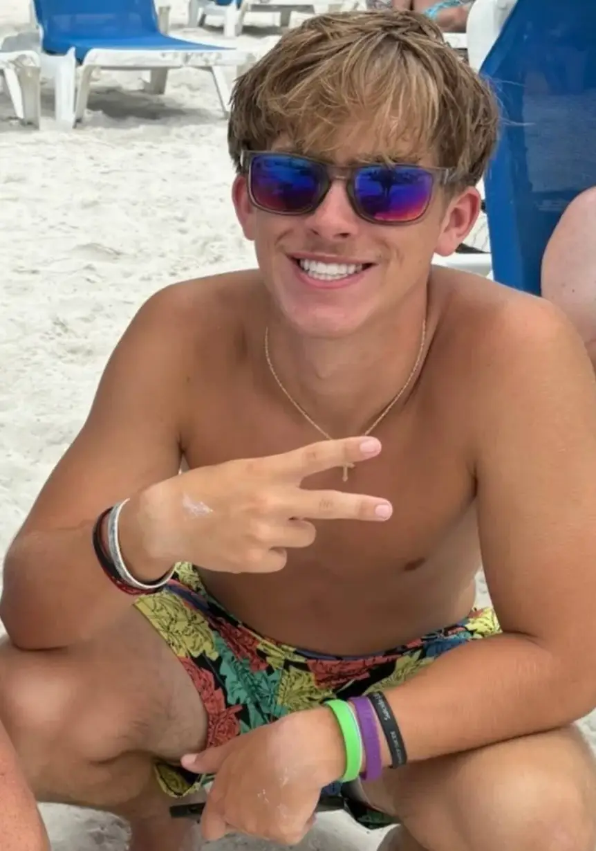 His dad Adam says scammers convinced the teen he had 'ruined his life forever' (Facebook)