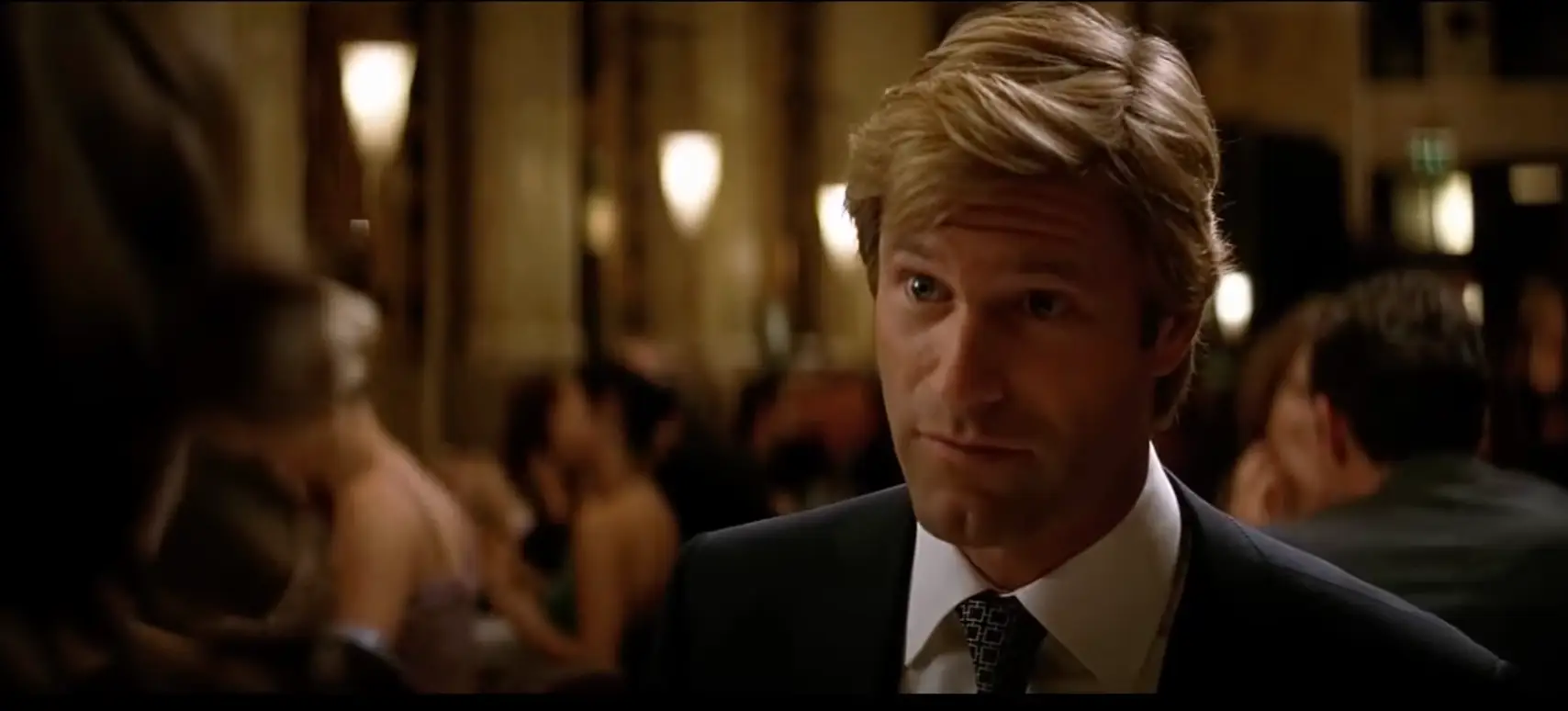 The line is said by Harvey Dent.