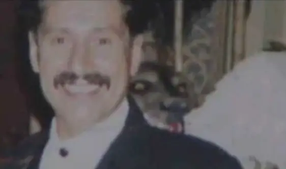 The so-called hellhound chillingly appeared over Joe's left shoulder in the image (YouTube/Fox News)