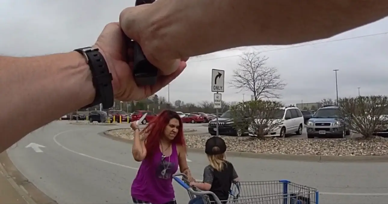 Shocking bodycam footage captured Guzman thrusting the knife towards little Cyler (Omaha Police Department)